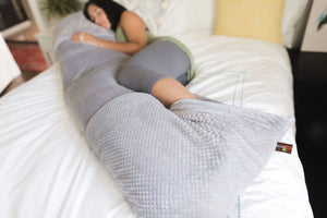 Sloucher Luxe Pillow Foot Tucked Pose in Gray Plush